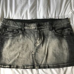 Grunge, distressed denim mini skirt